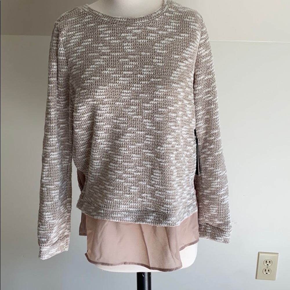 Oatmeal sweater with beige hem